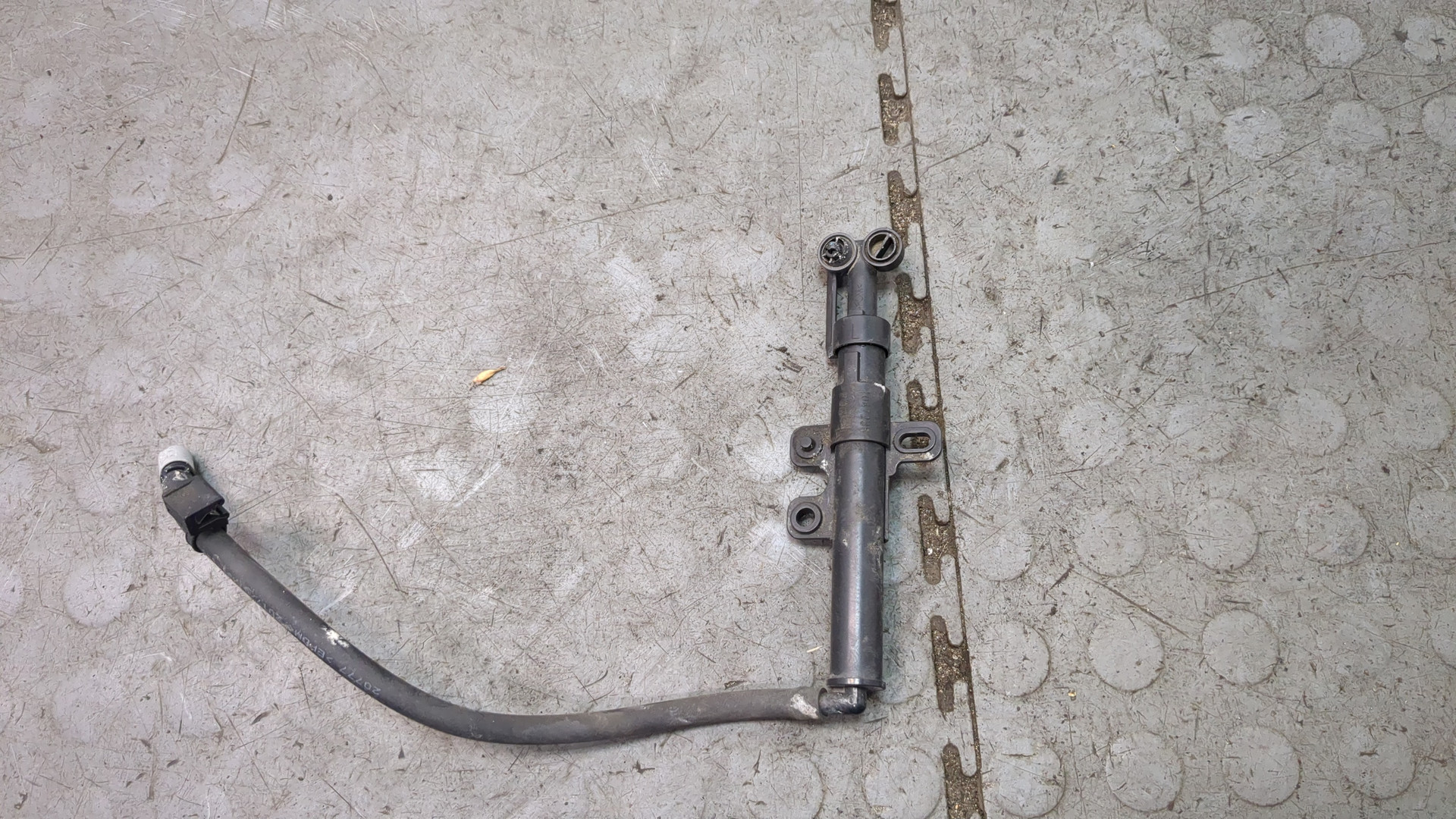 Форсунка омывателя фары