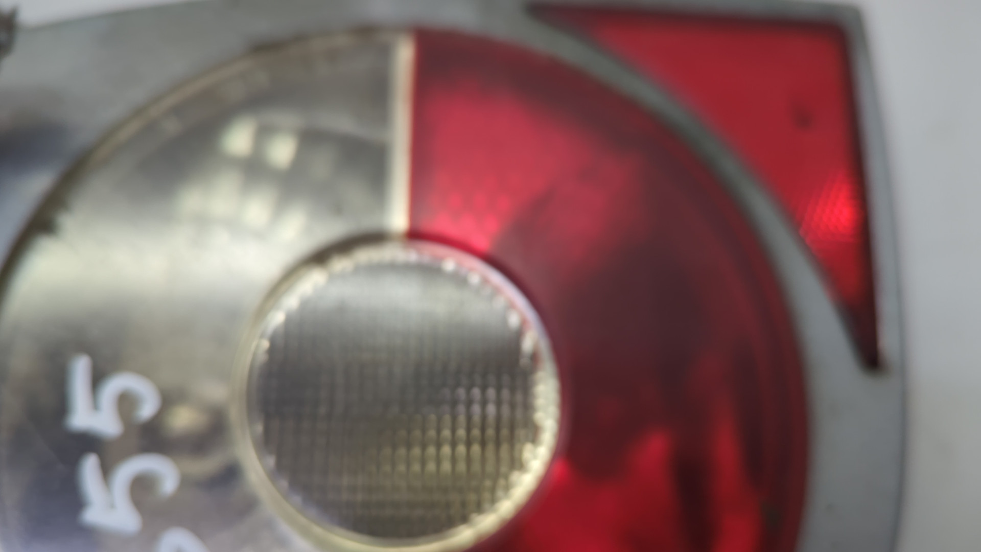 Фонарь задний левый