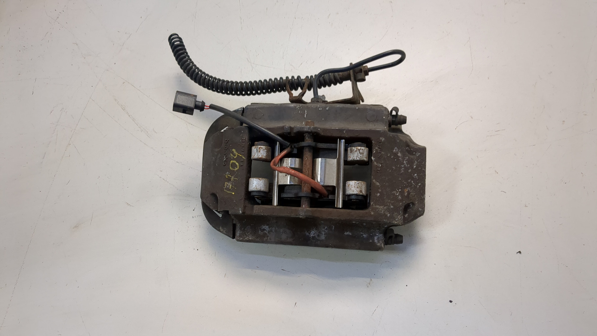 Суппорт задний левый