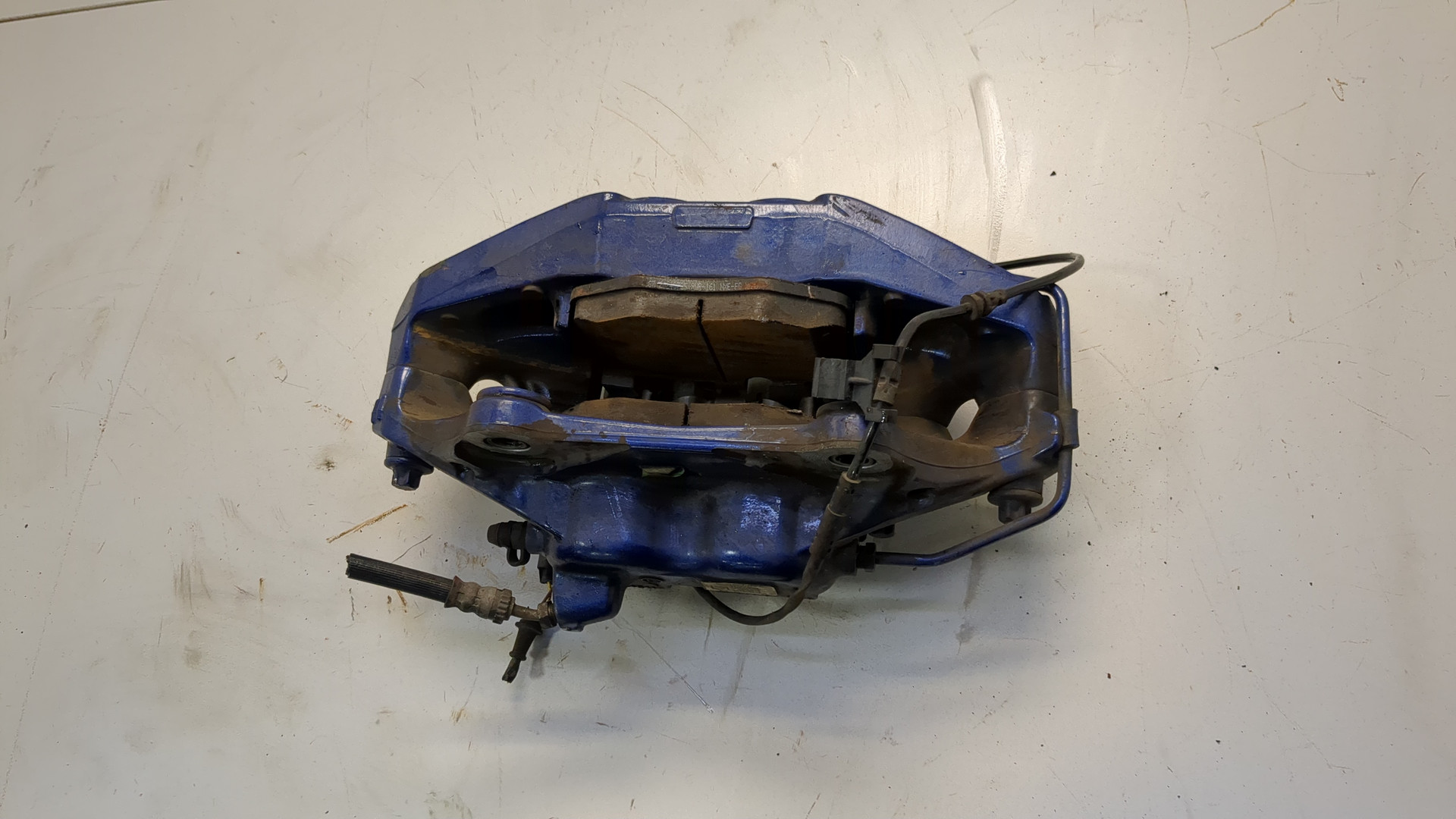 Суппорт передний левый