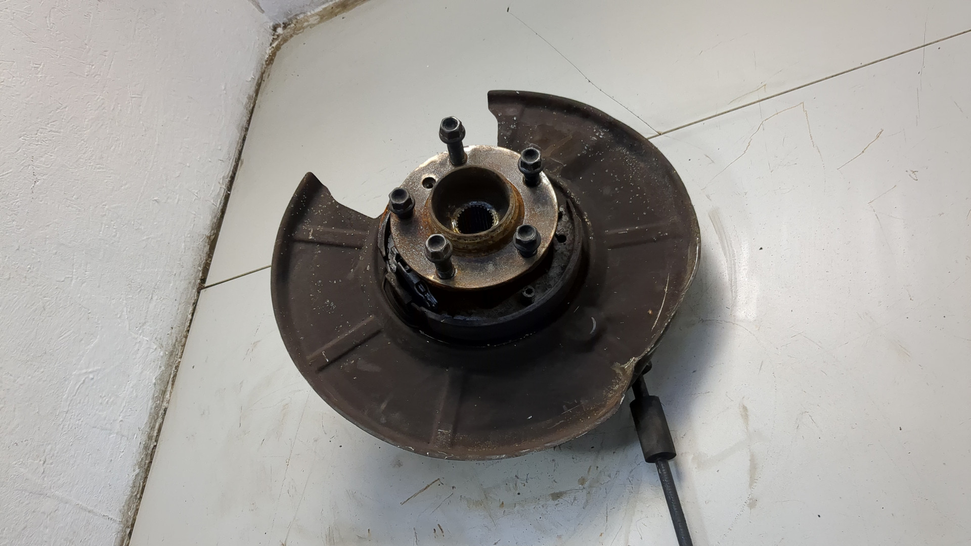 Кулак поворотный задний левый