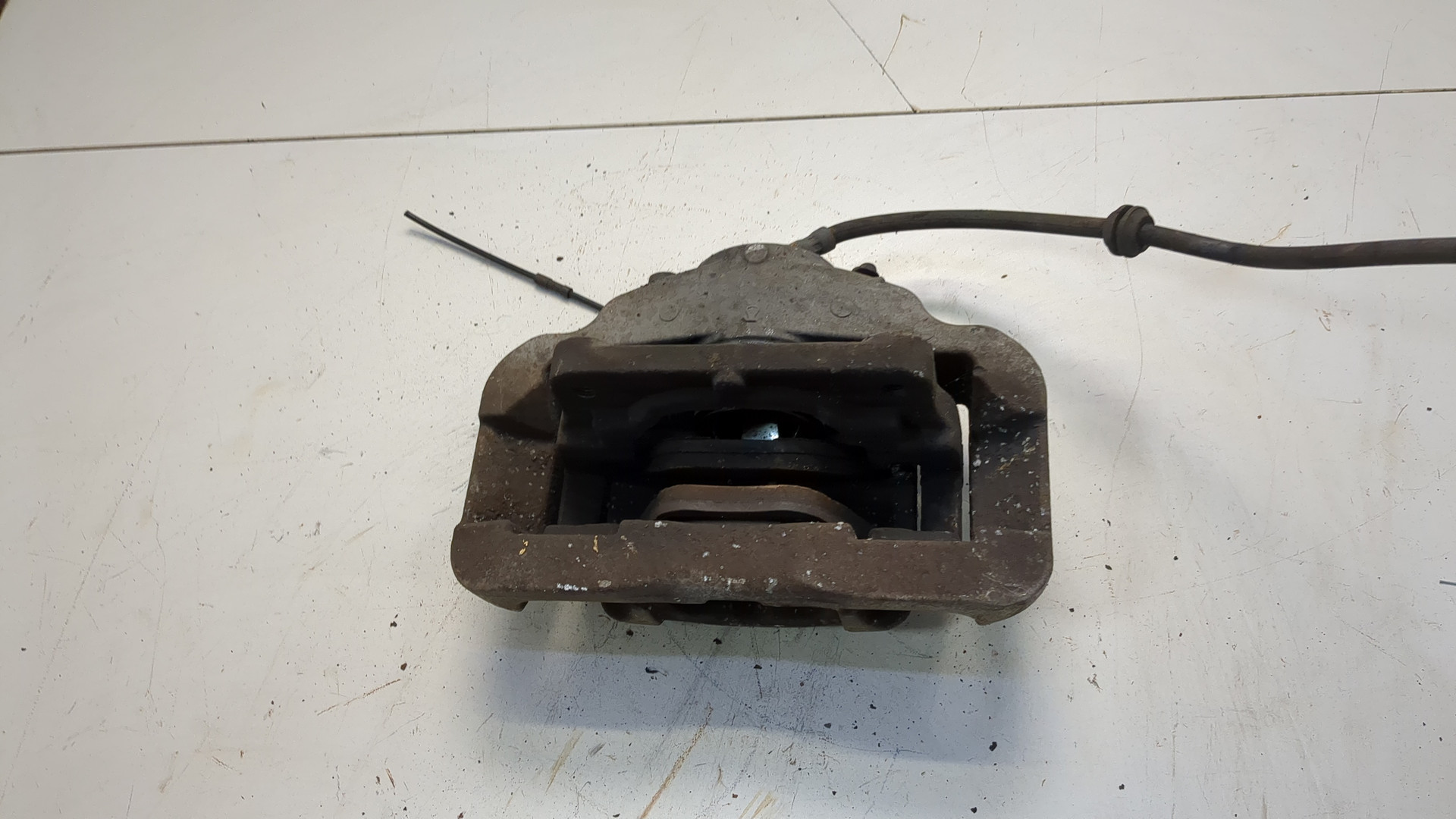 Суппорт передний левый