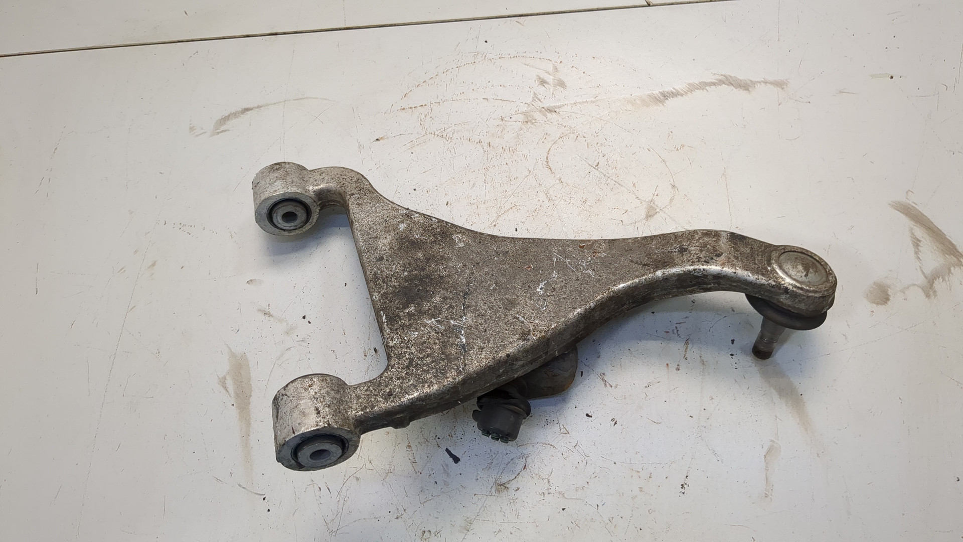 Рычаг задний левый