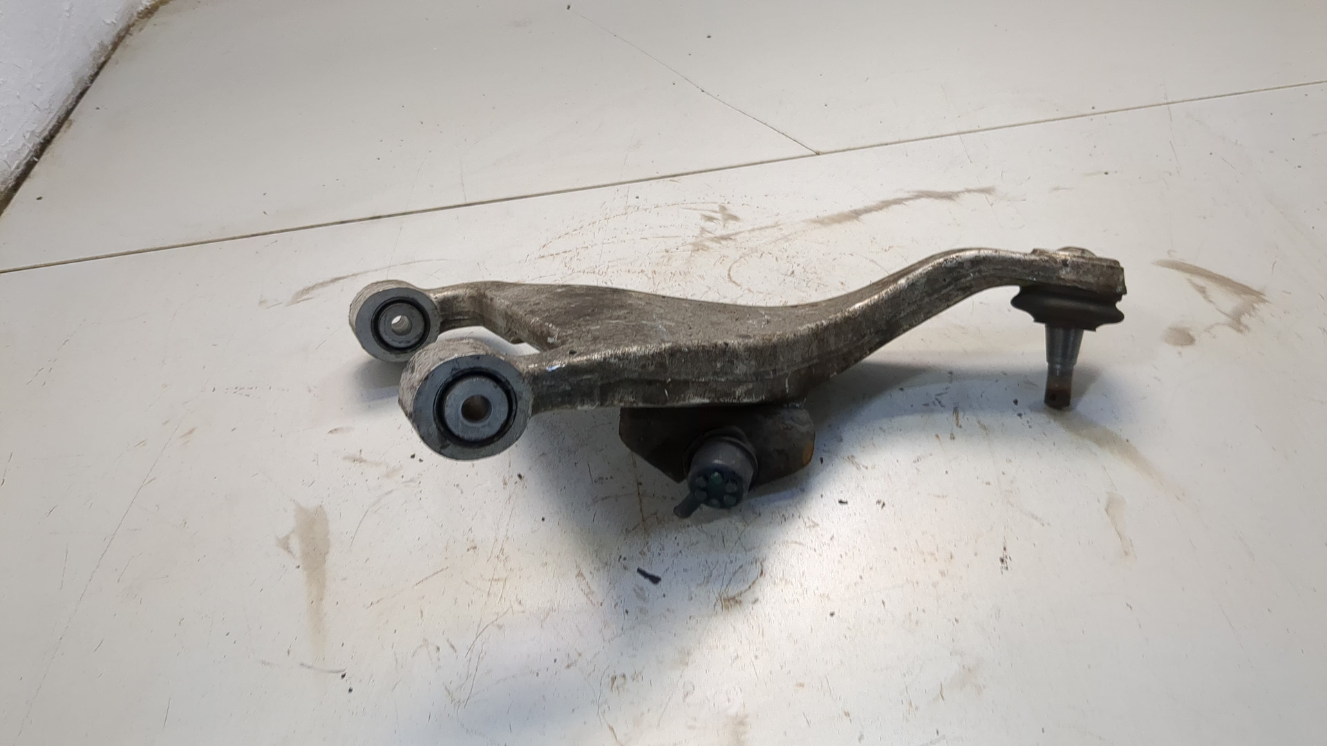 Рычаг задний левый