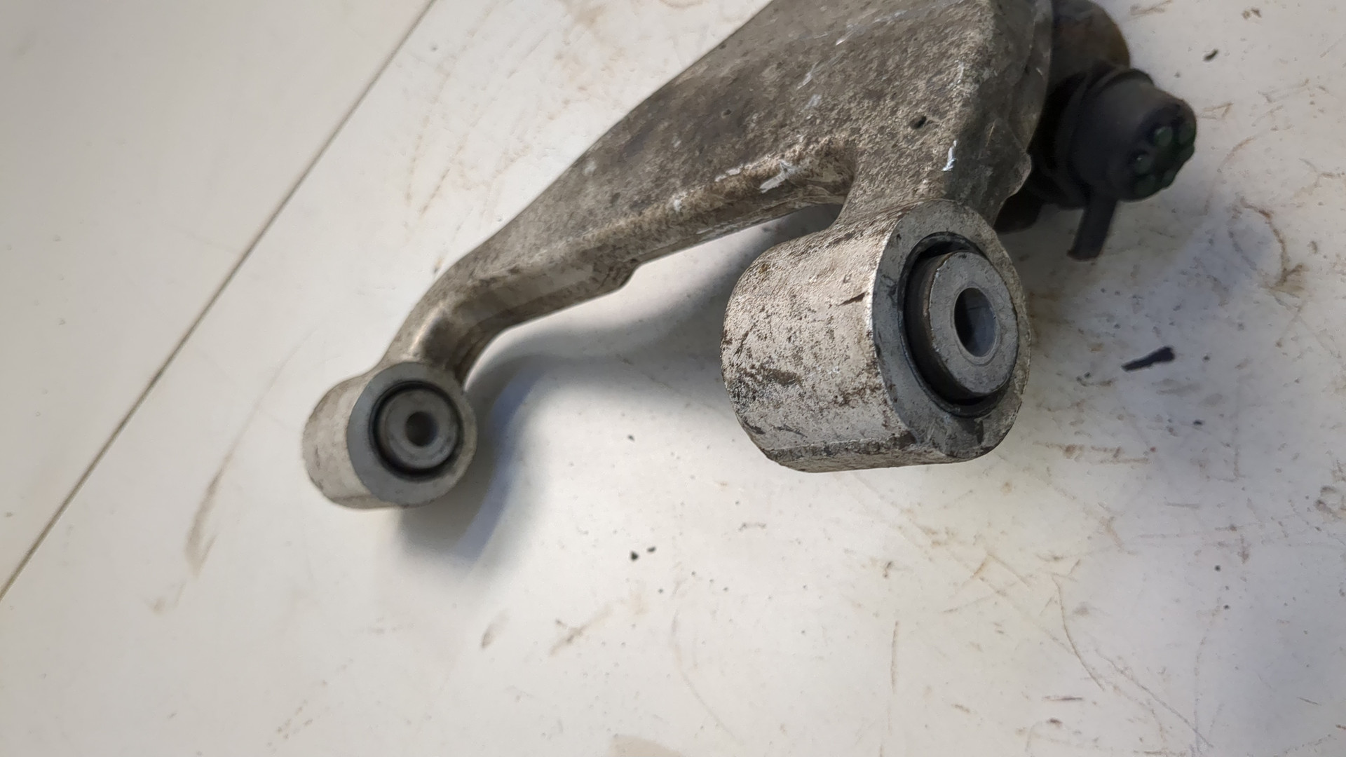 Рычаг задний левый