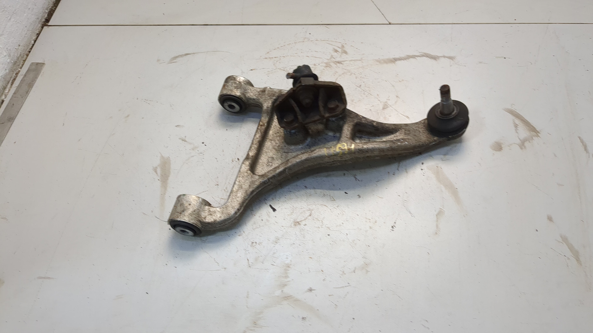 Рычаг задний левый