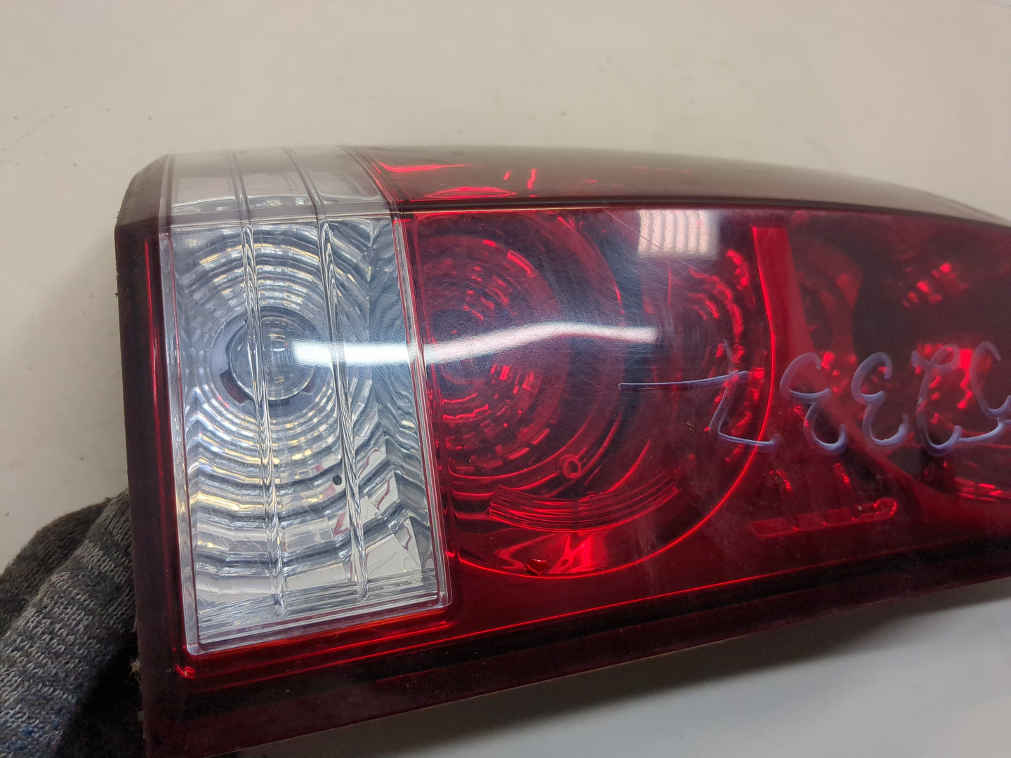 Фонарь задний левый