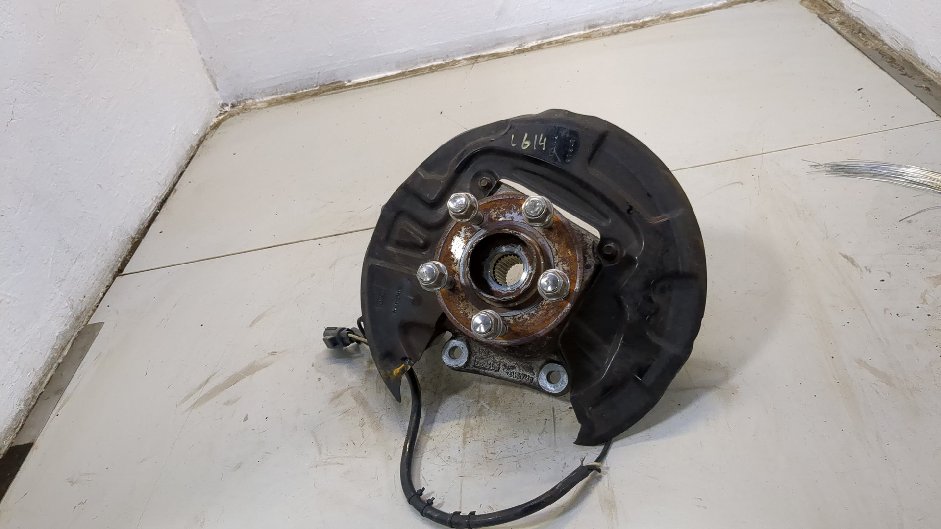 Кулак поворотный задний левый