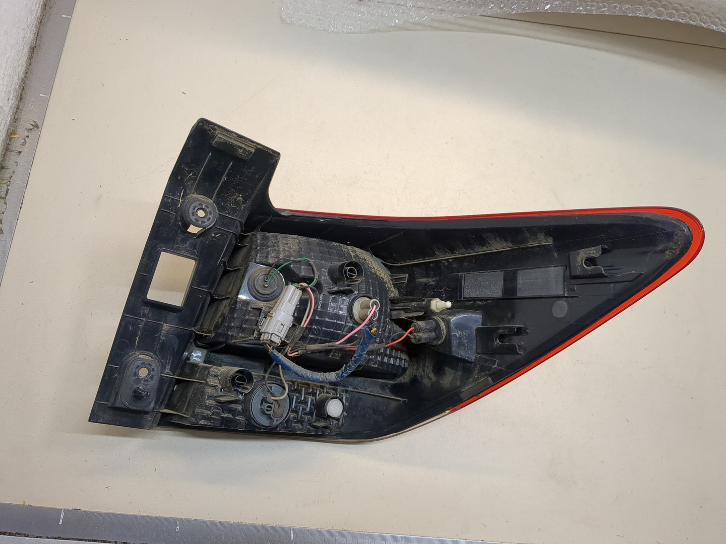 Фонарь задний левый