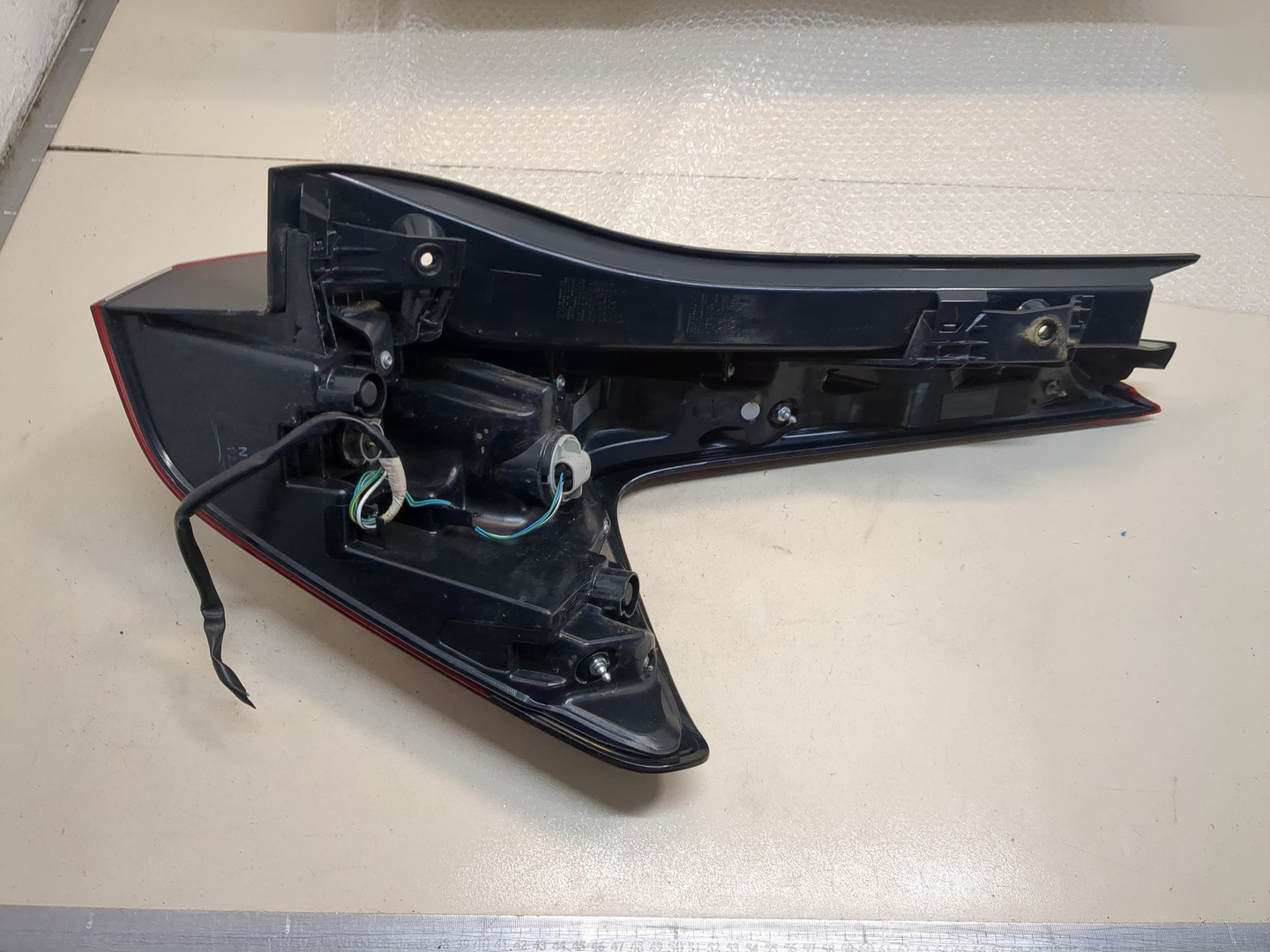 Фонарь задний левый