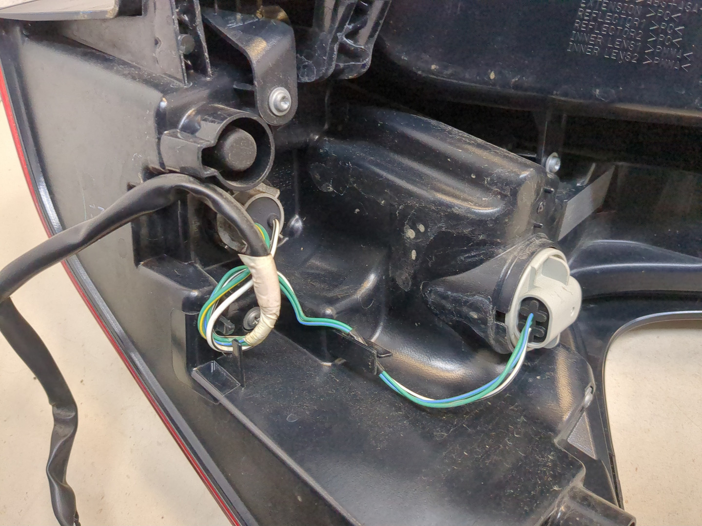 Фонарь задний левый