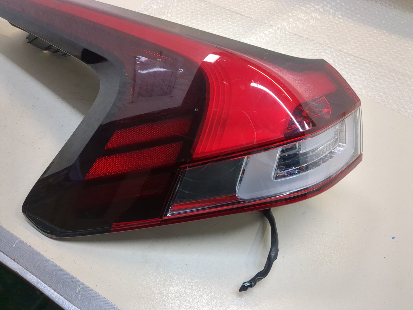 Фонарь задний левый