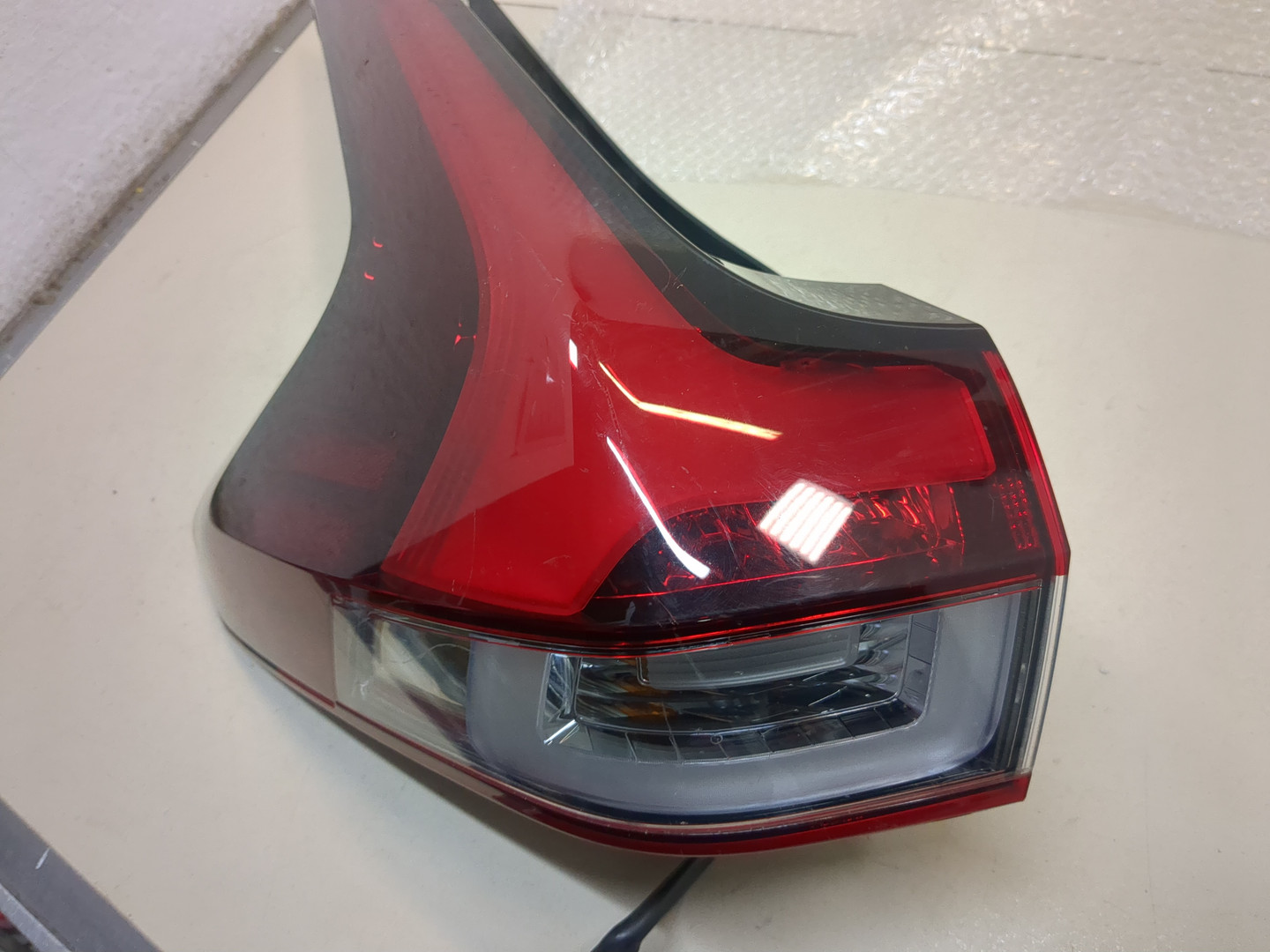 Фонарь задний левый