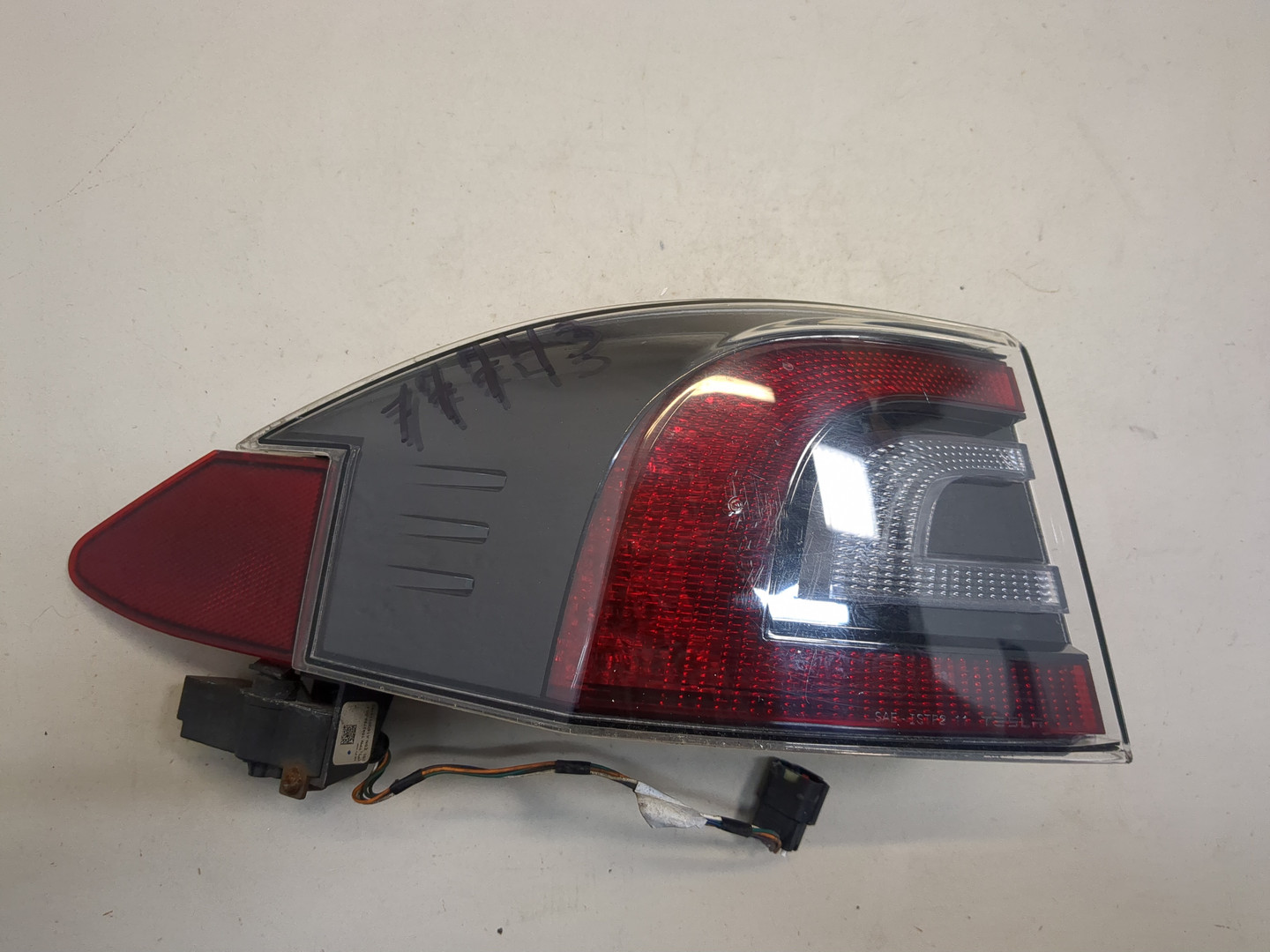 Фонарь задний левый