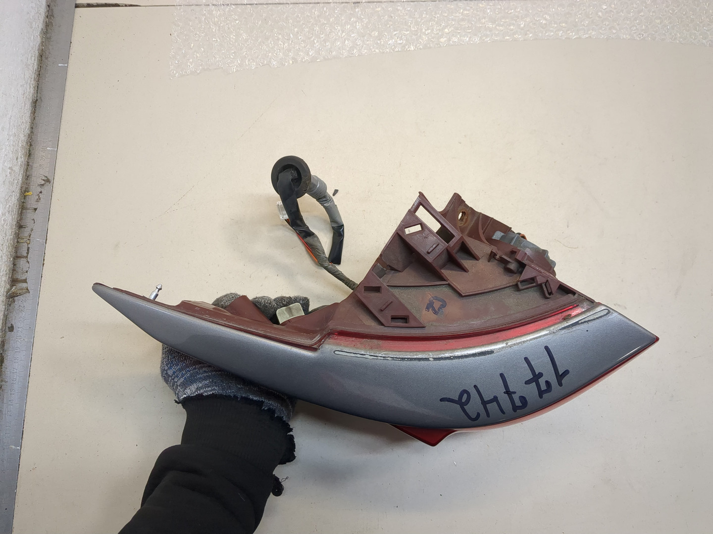 Фонарь задний левый