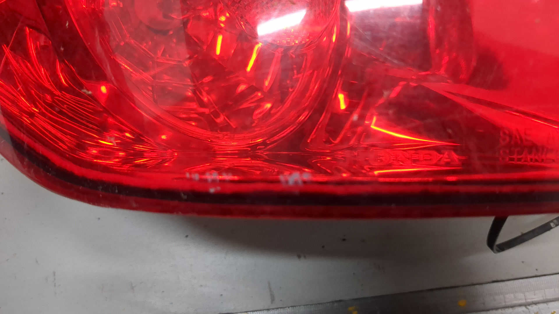 Фонарь задний левый