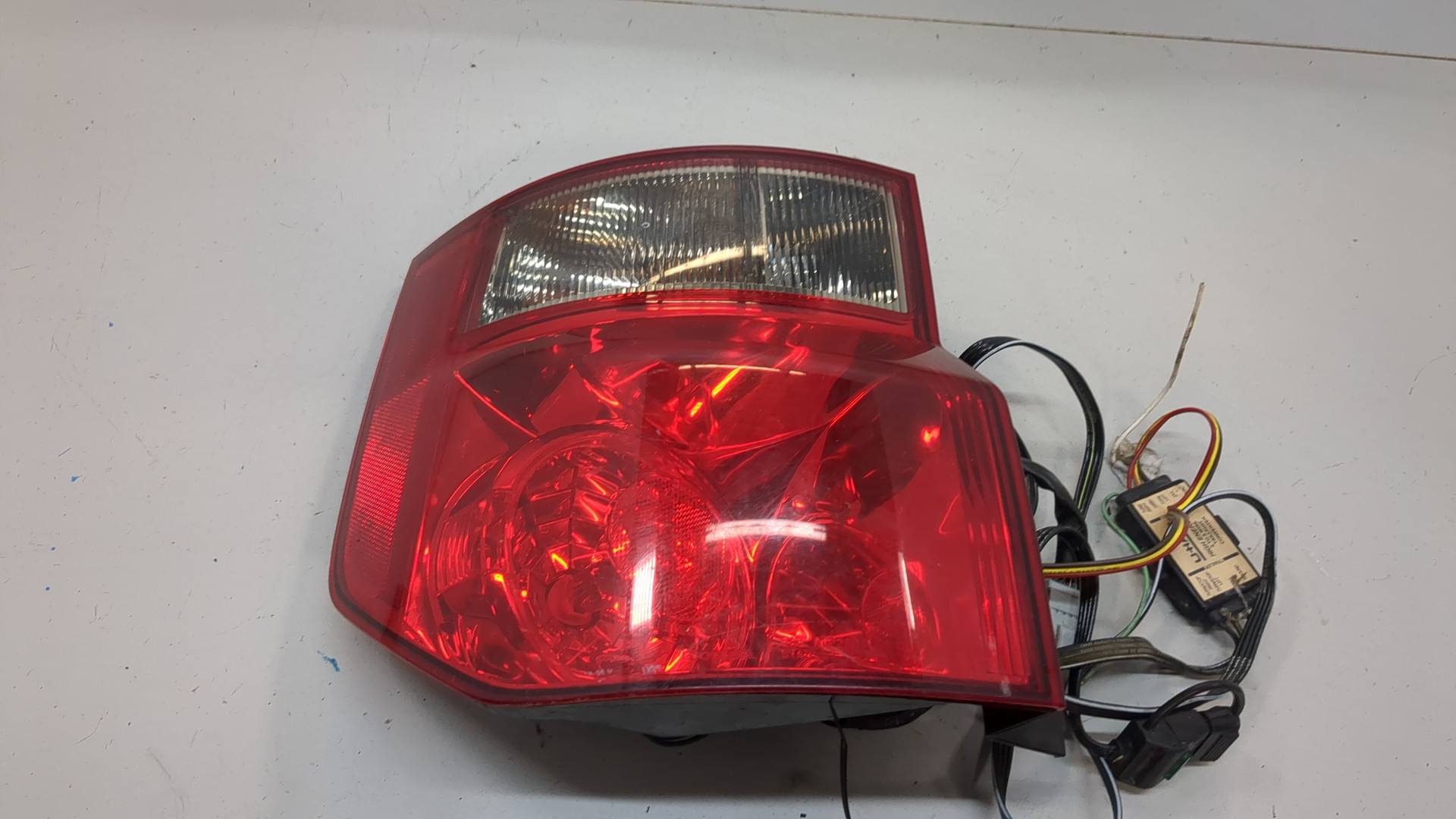 Фонарь задний левый