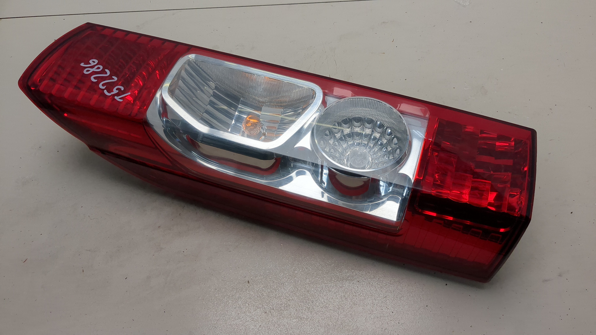 Фонарь задний левый