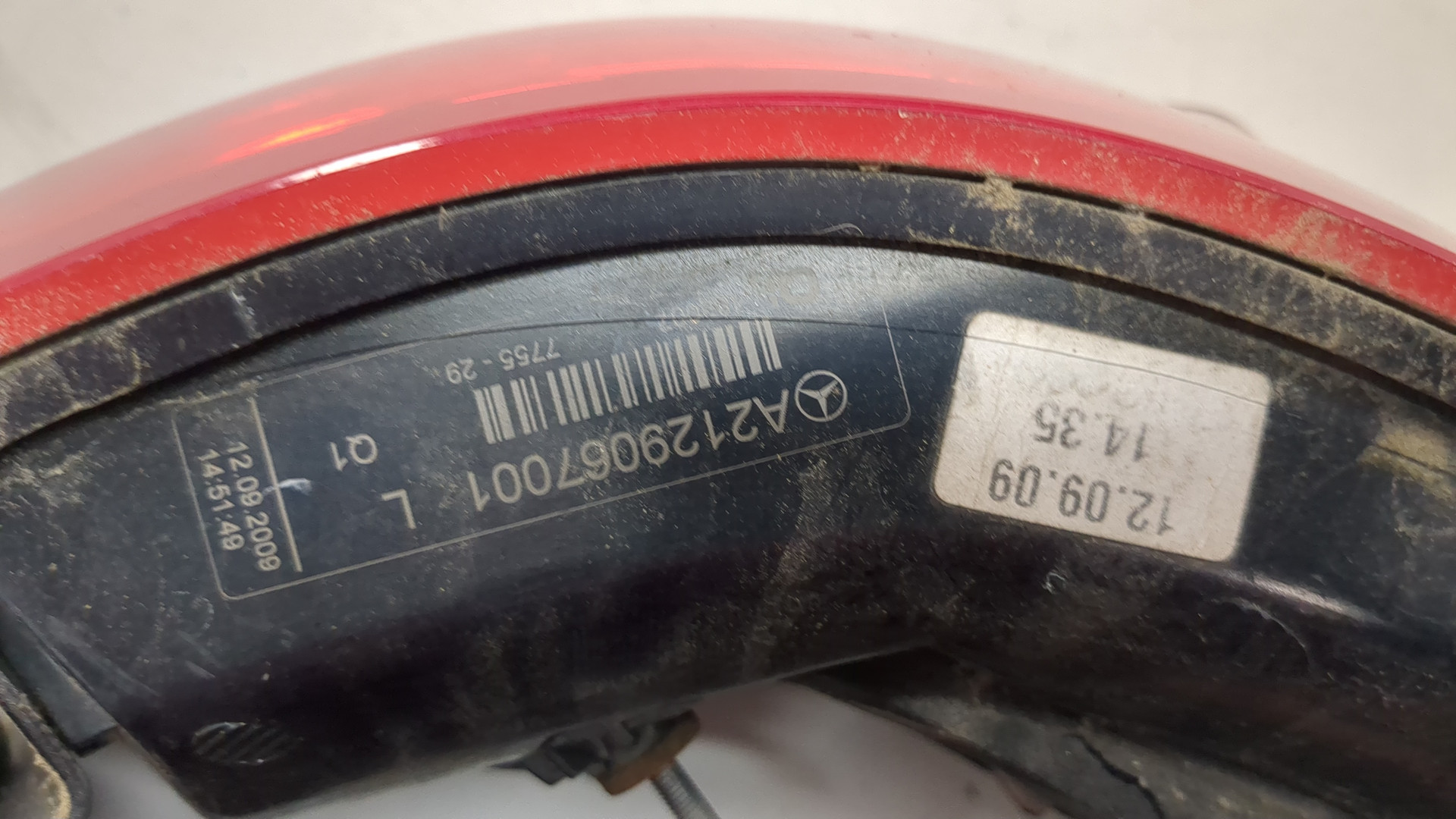 Фонарь задний левый