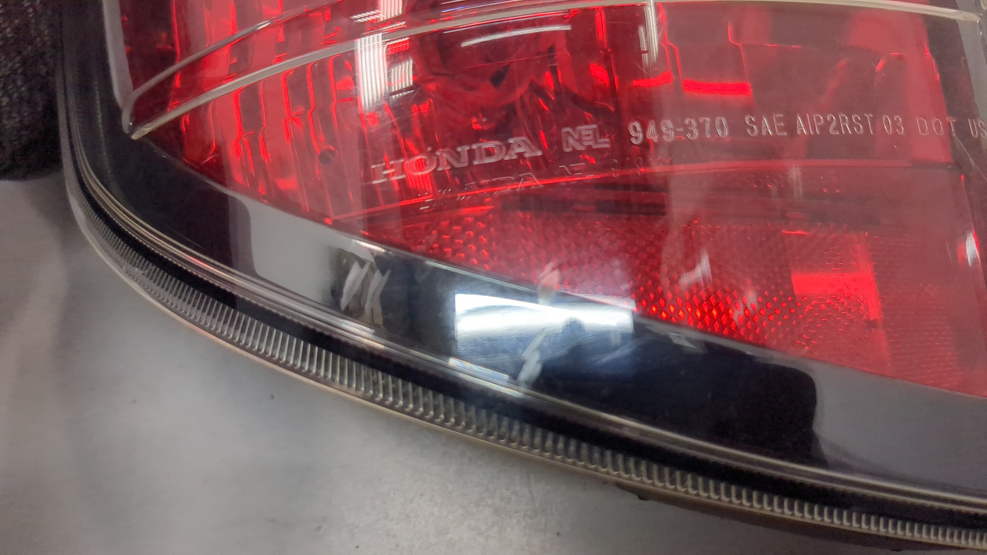 Фонарь задний левый