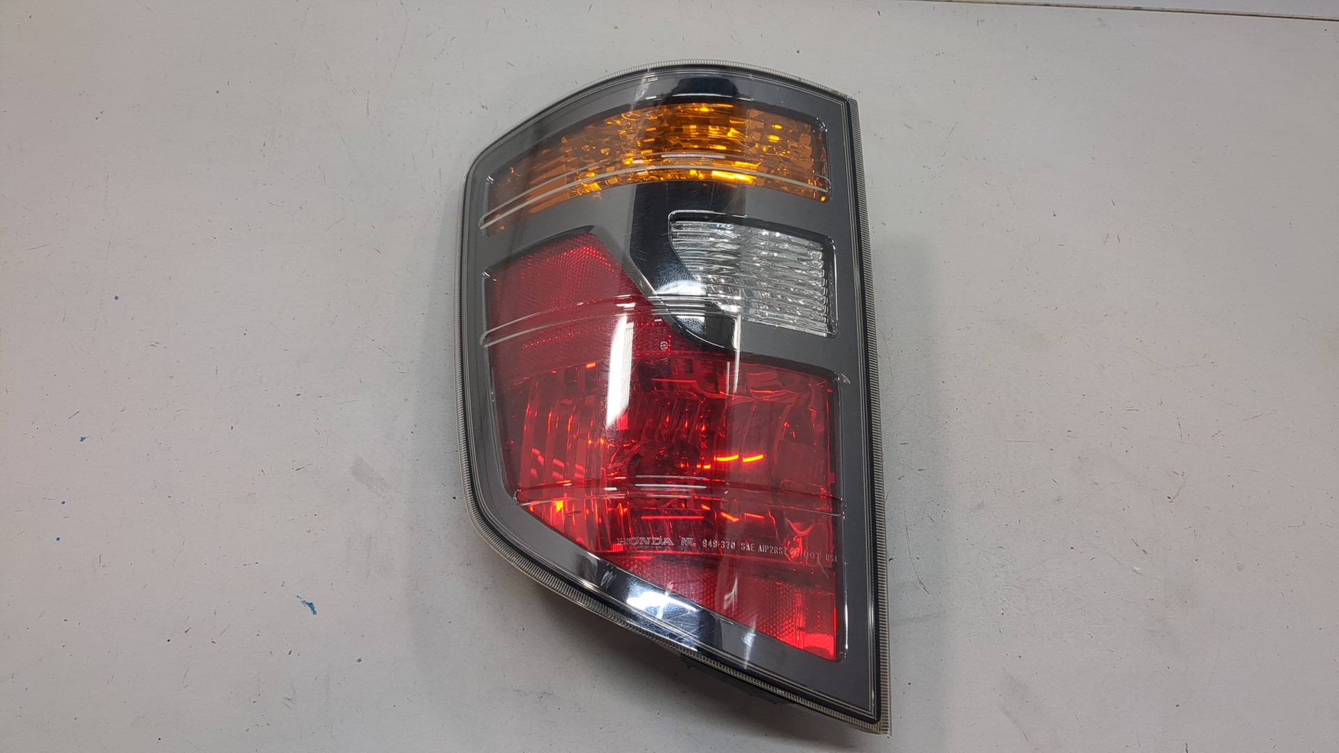 Фонарь задний левый