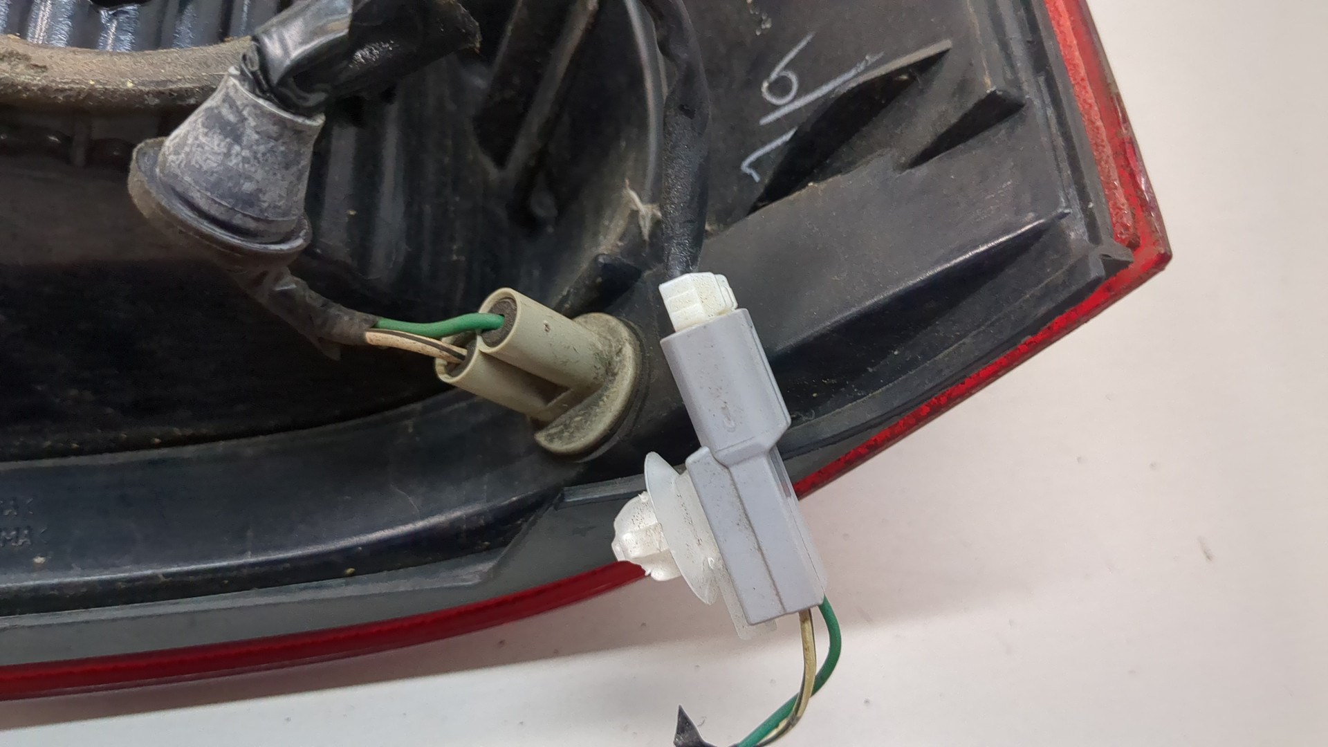 Фонарь задний левый