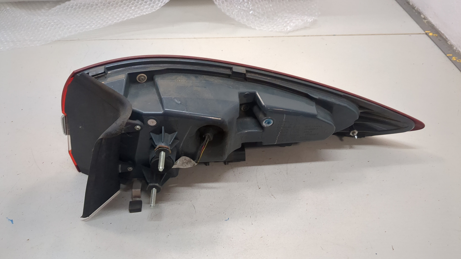 Фонарь задний левый