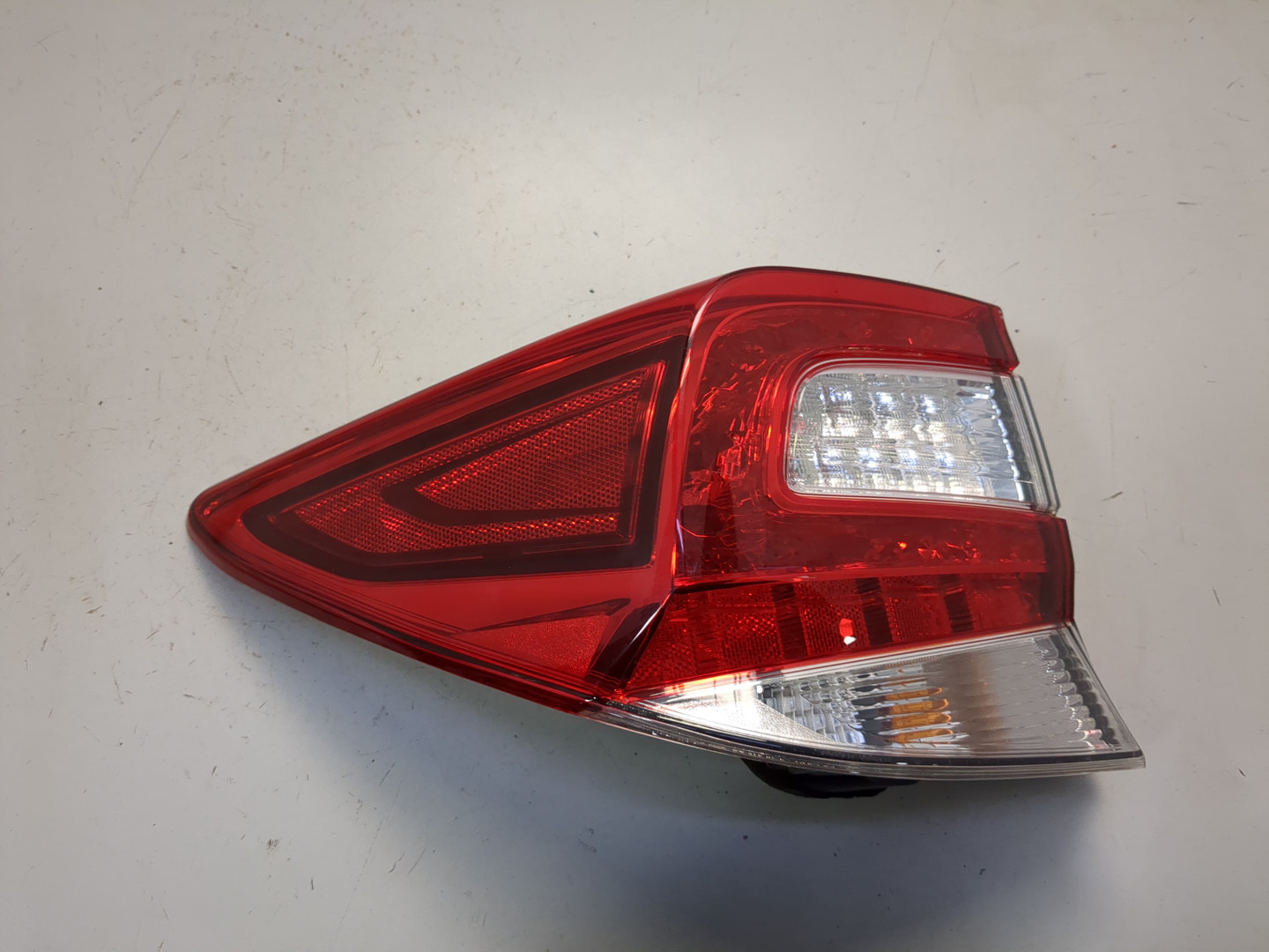 Фонарь задний левый