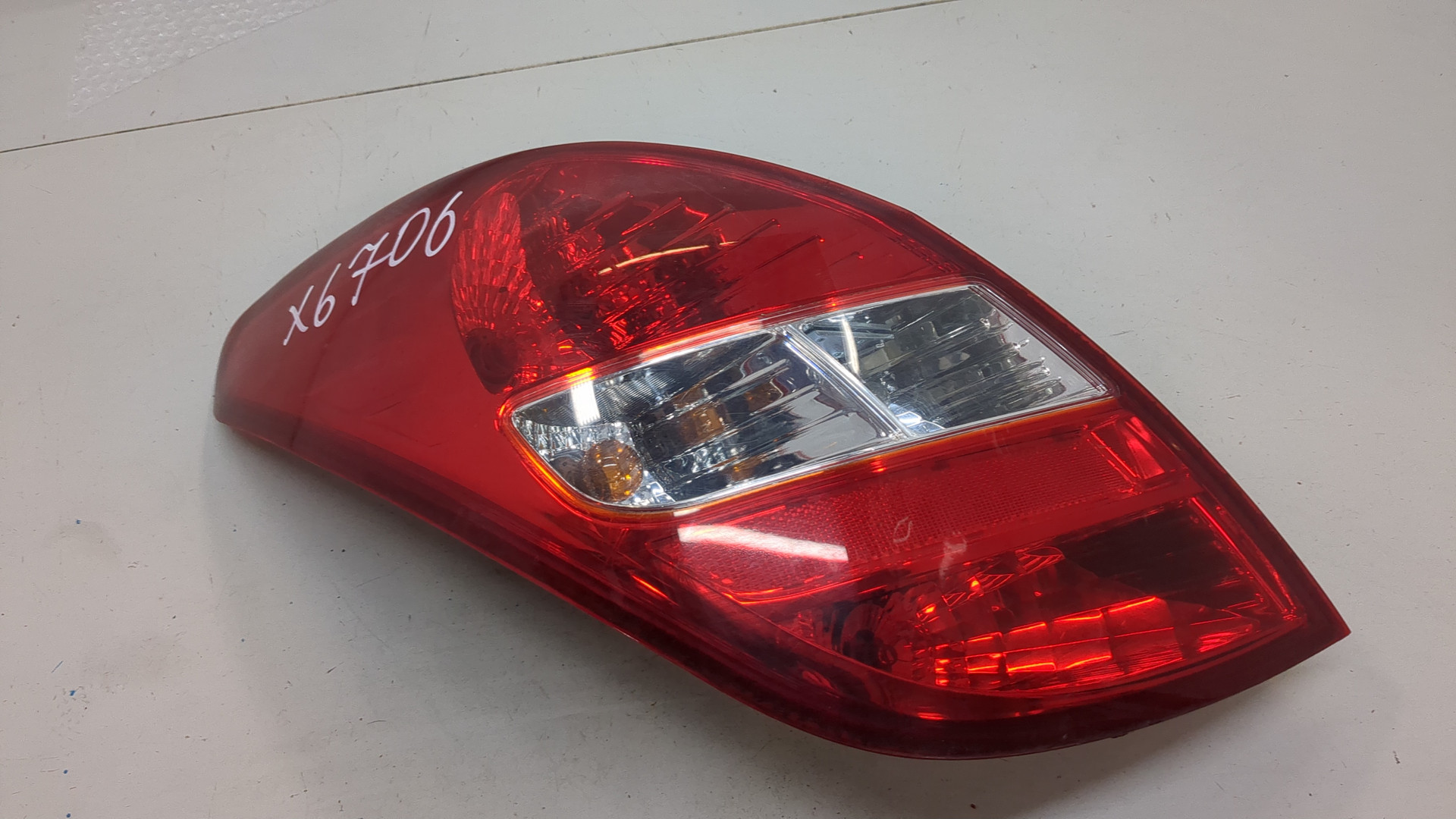 Фонарь задний левый