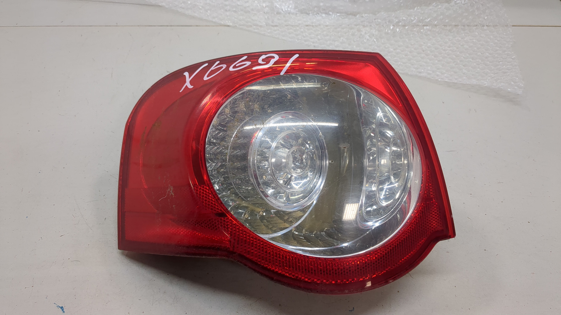 Фонарь задний левый