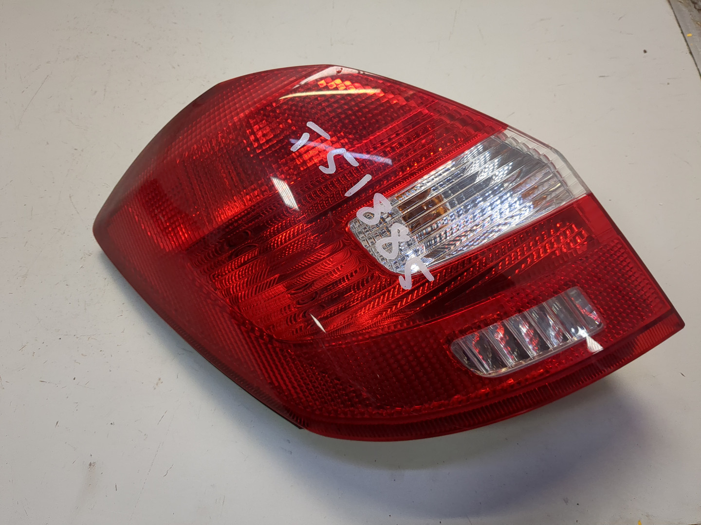 Фонарь задний левый