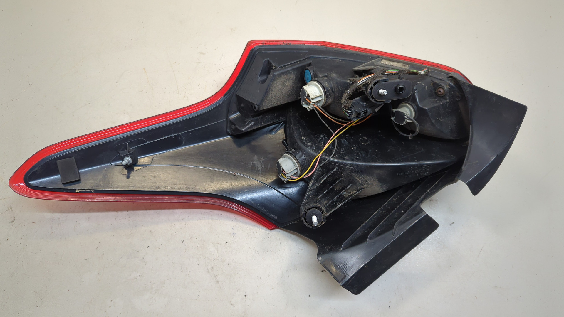 Фонарь задний левый