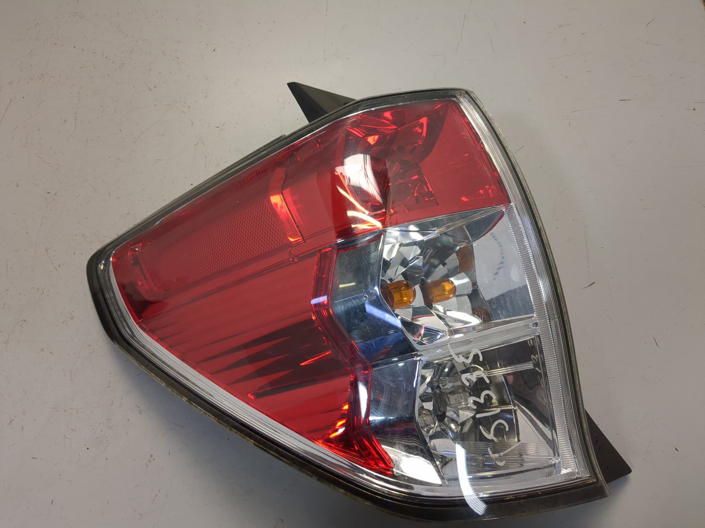 Фонарь задний левый