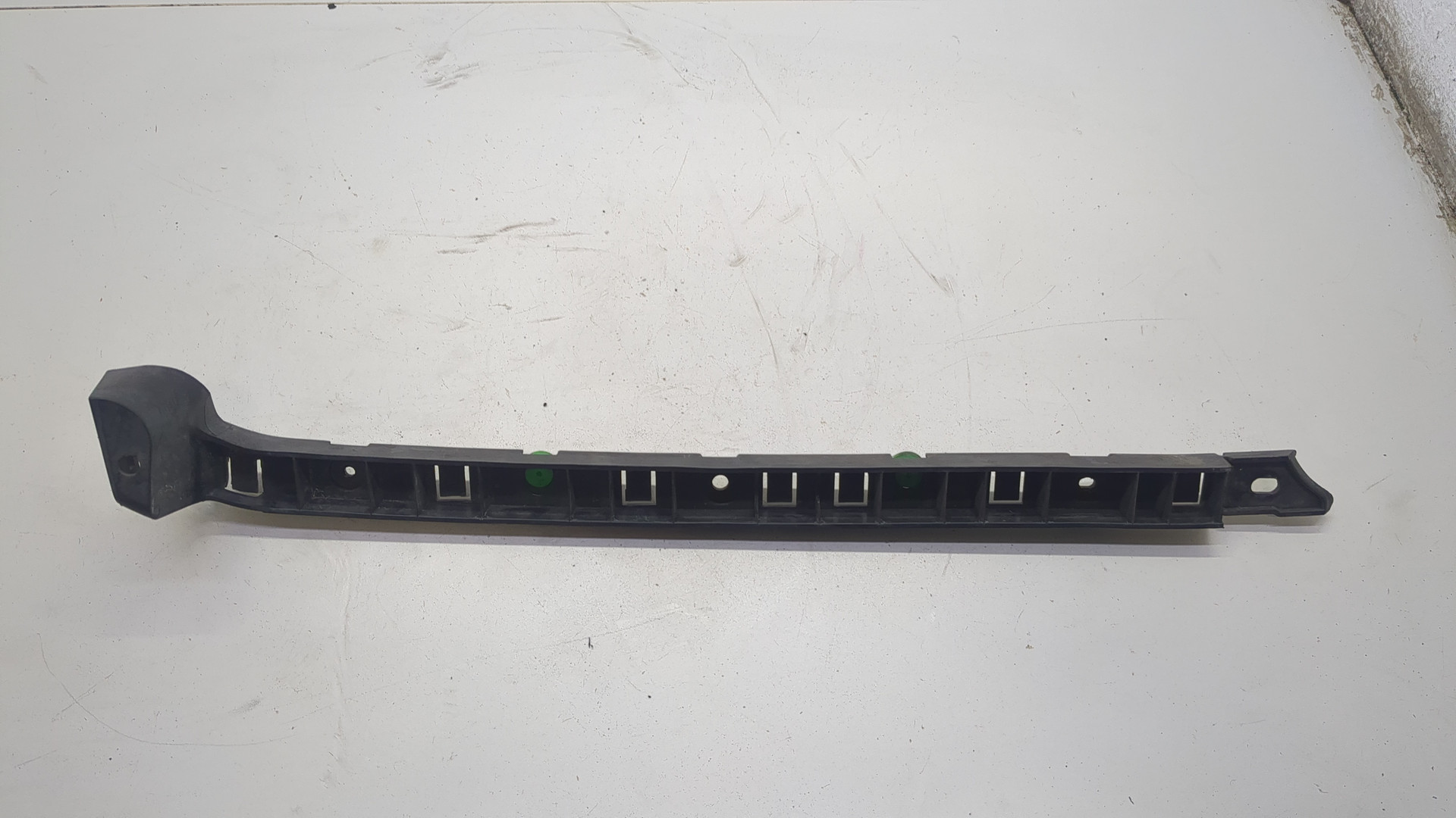 Кронштейн заднего бампера левый