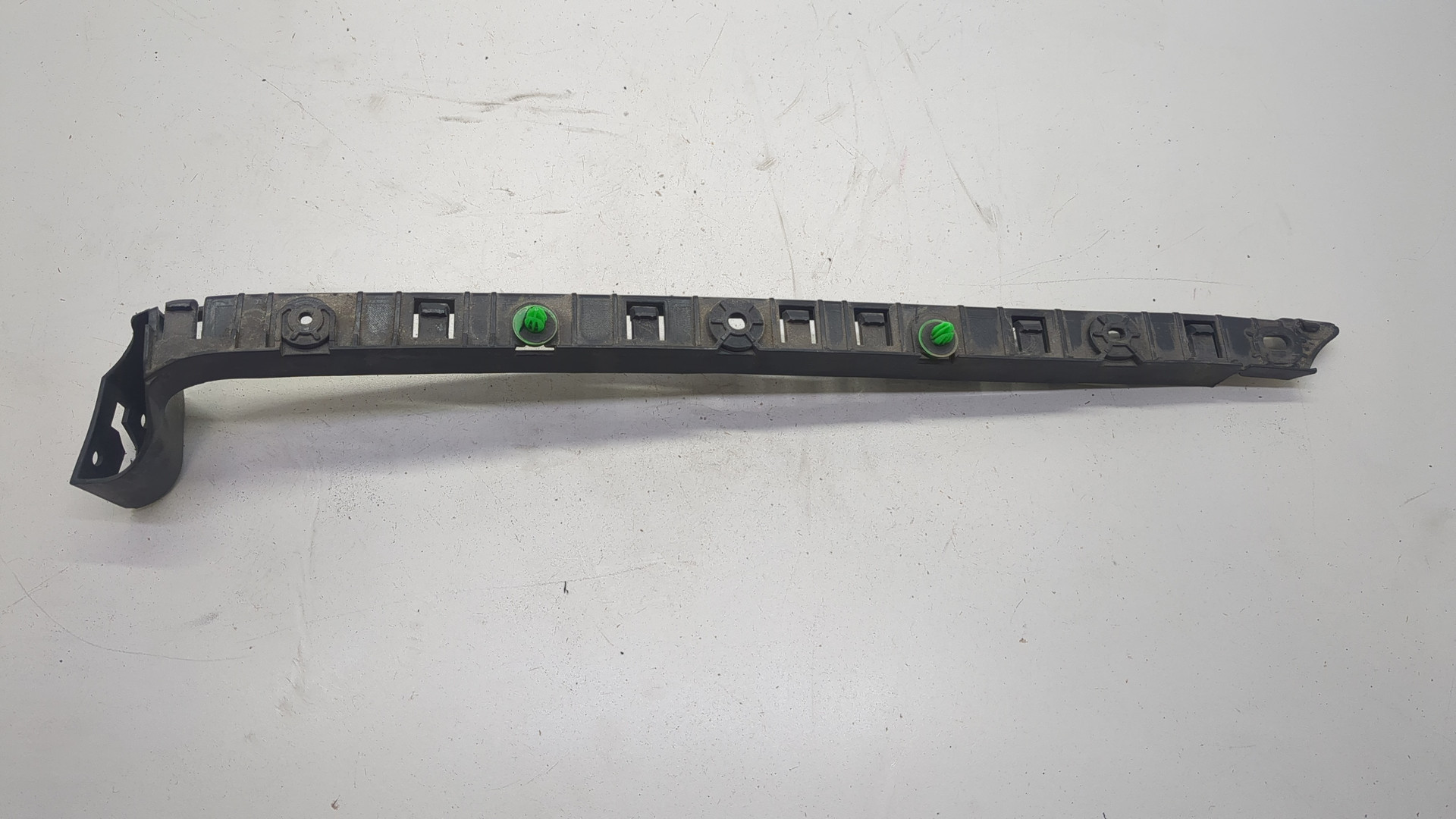 Кронштейн заднего бампера левый