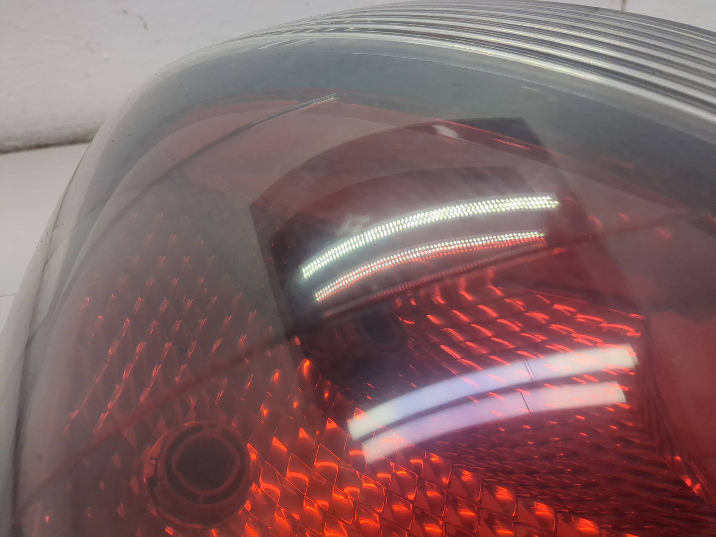 Фонарь задний левый