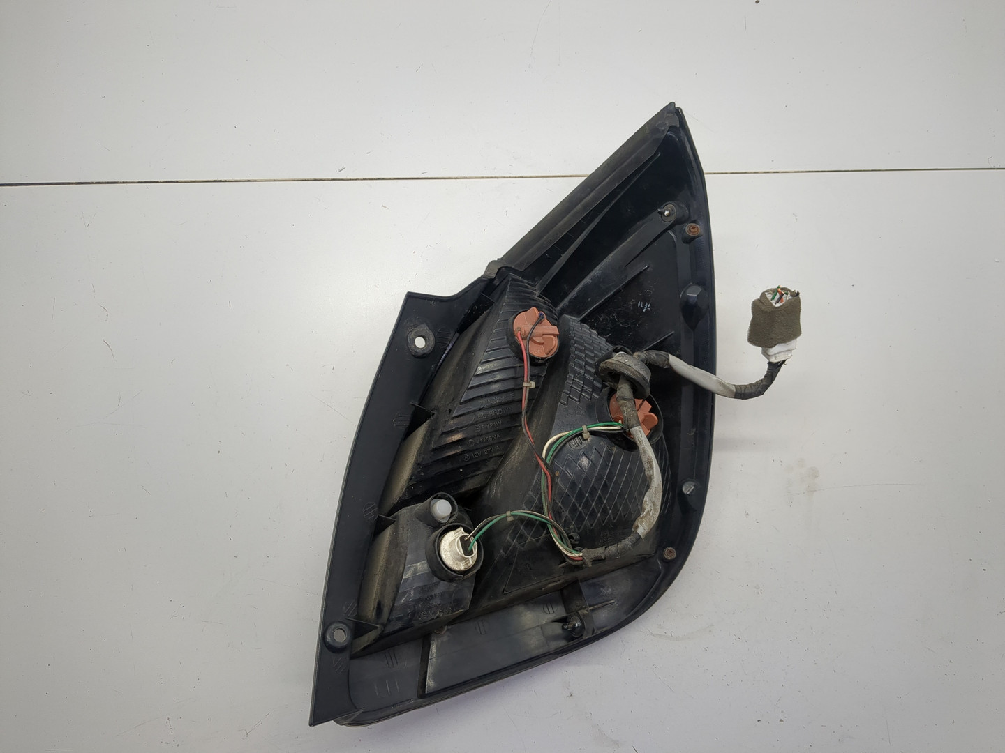 Фонарь задний левый