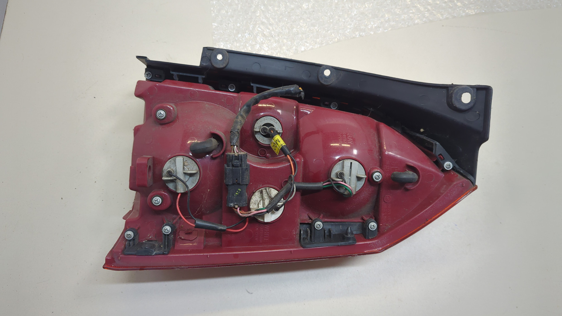 Фонарь задний левый