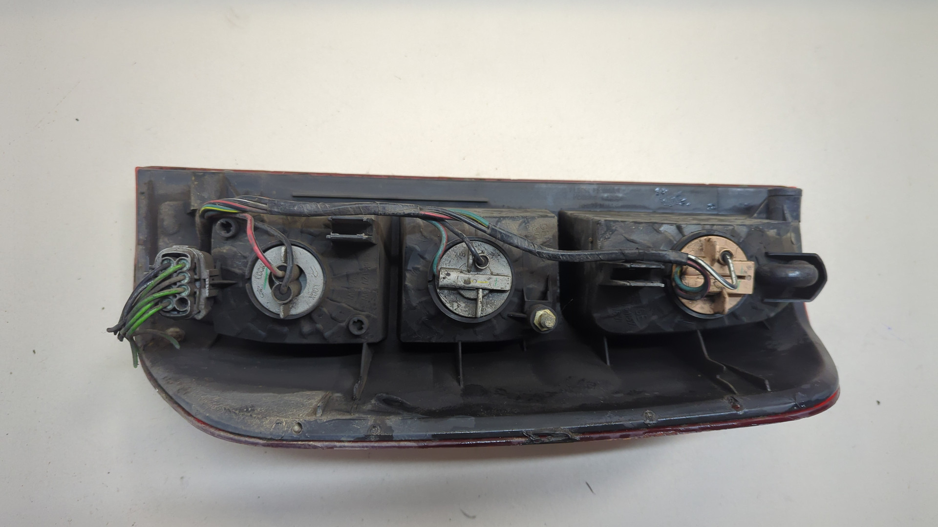 Фонарь задний левый