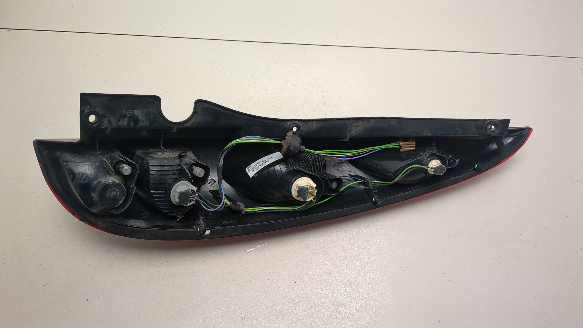 Фонарь задний левый