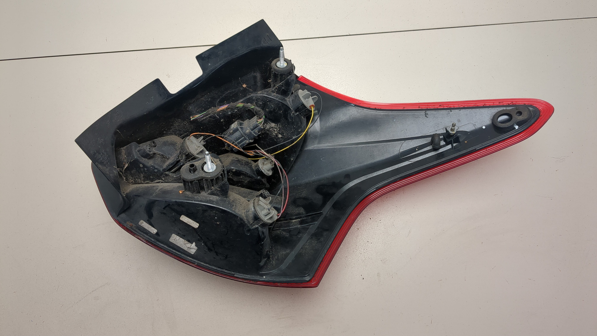 Фонарь задний левый