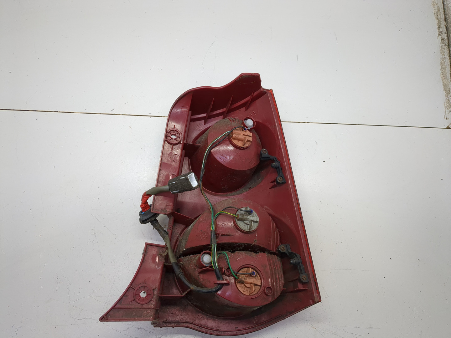 Фонарь задний левый