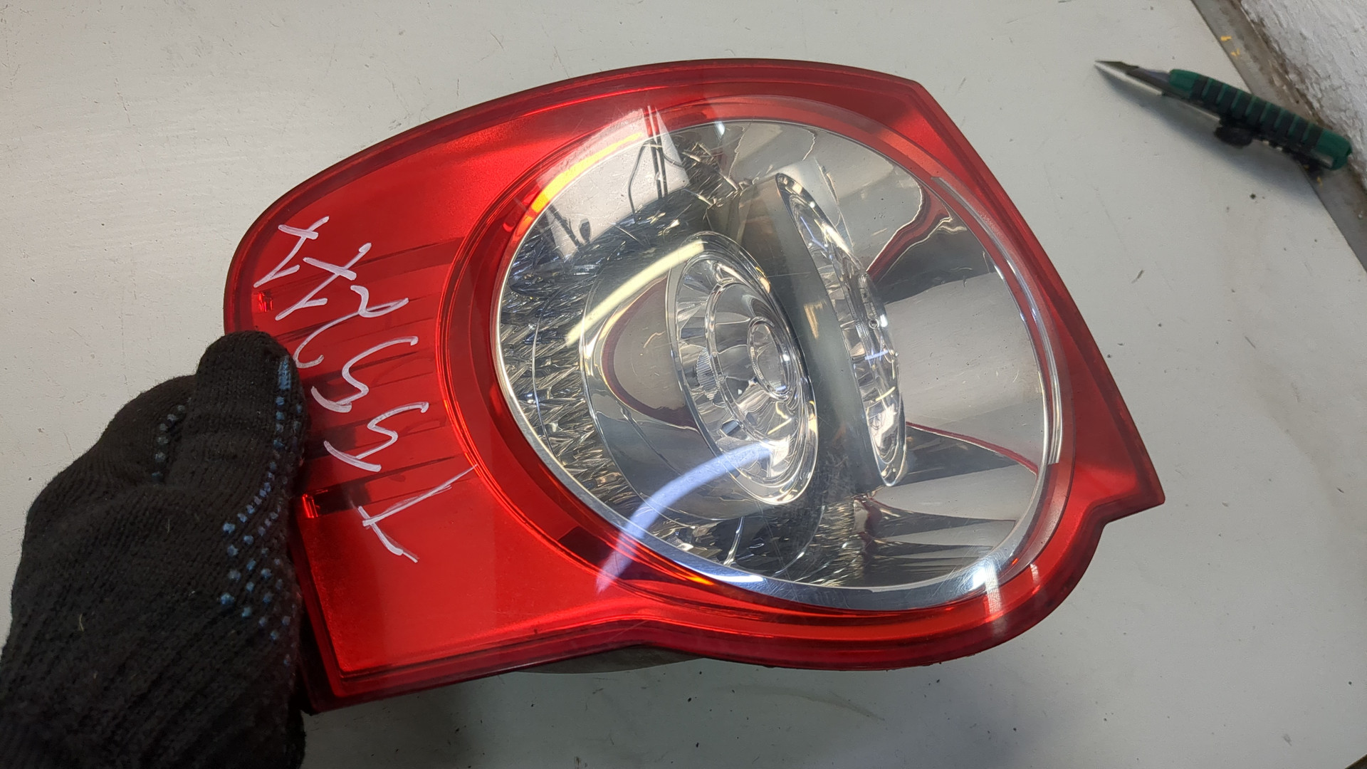 Фонарь задний левый