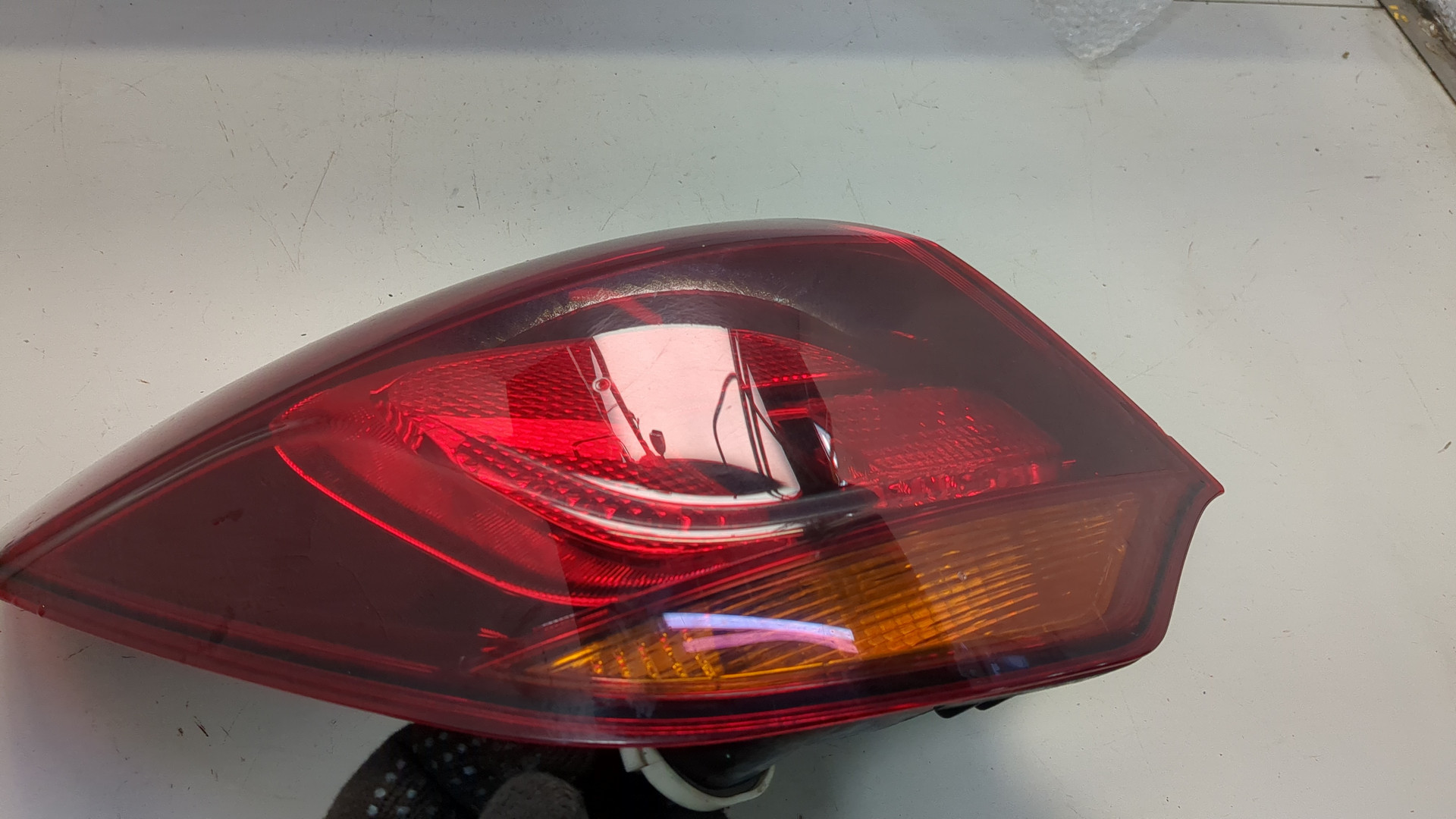 Фонарь задний левый