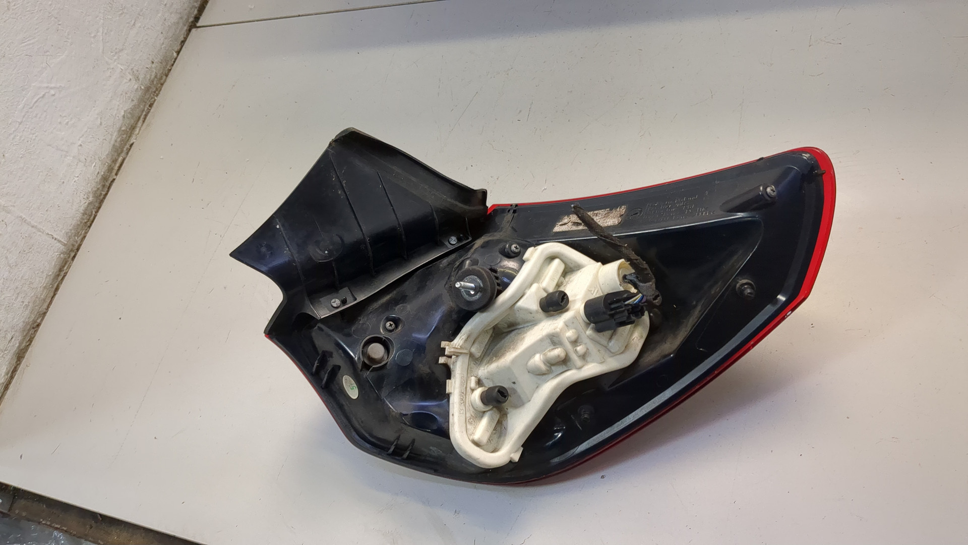 Фонарь задний левый