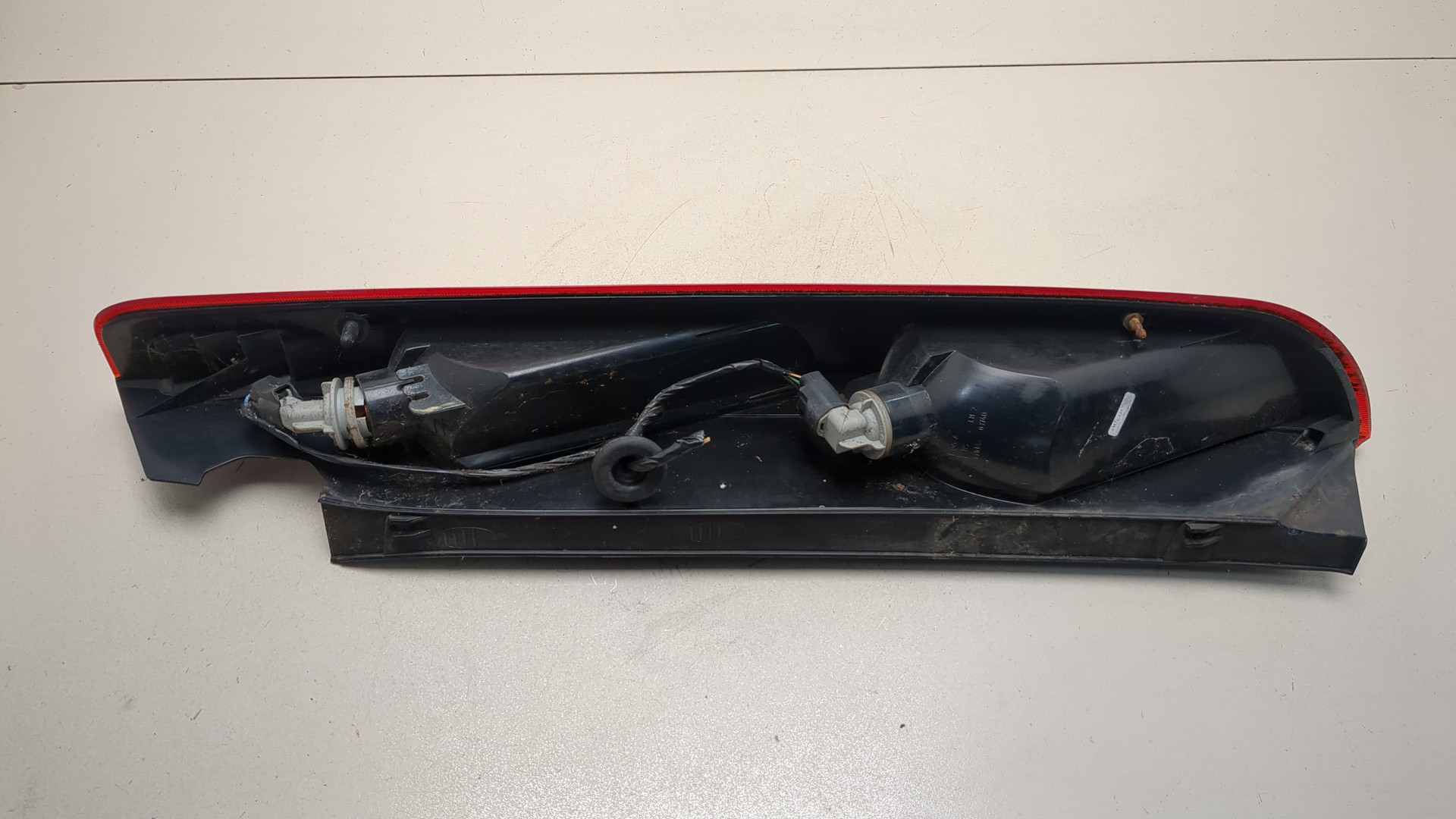 Фонарь задний левый