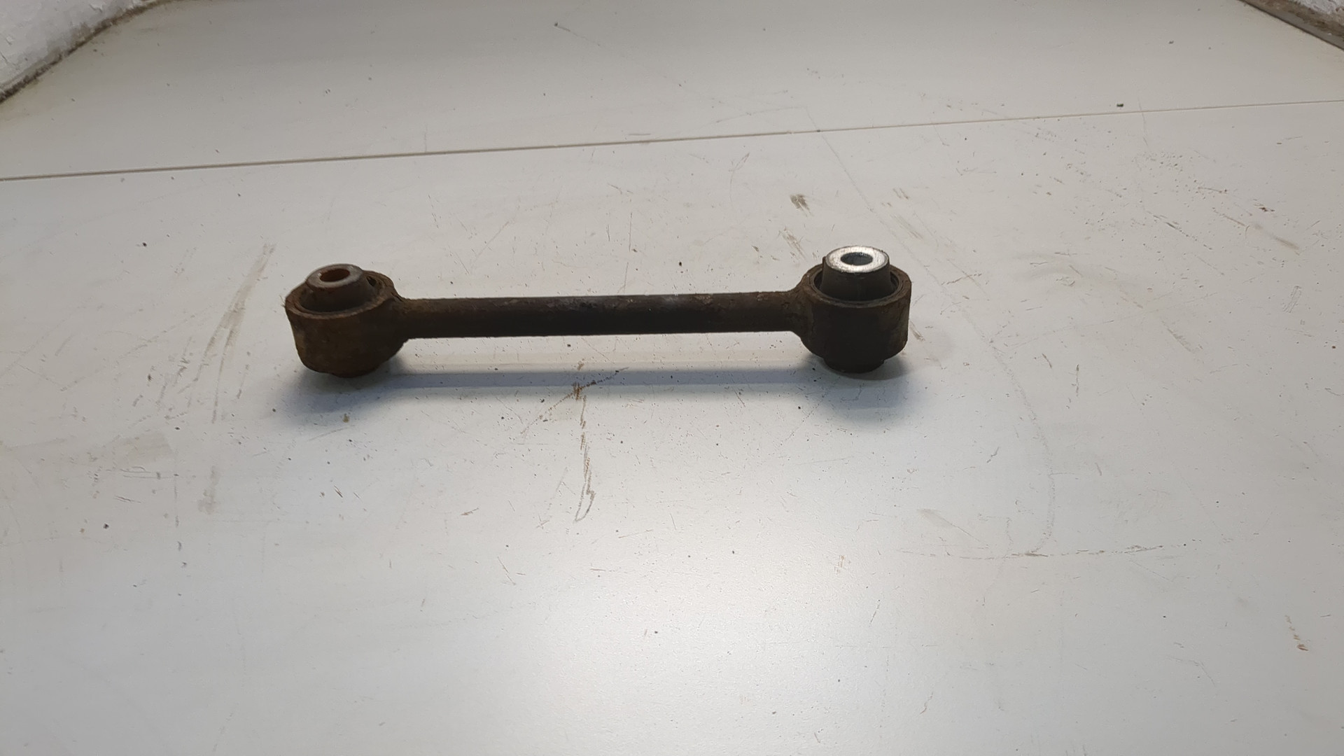 Рычаг задний