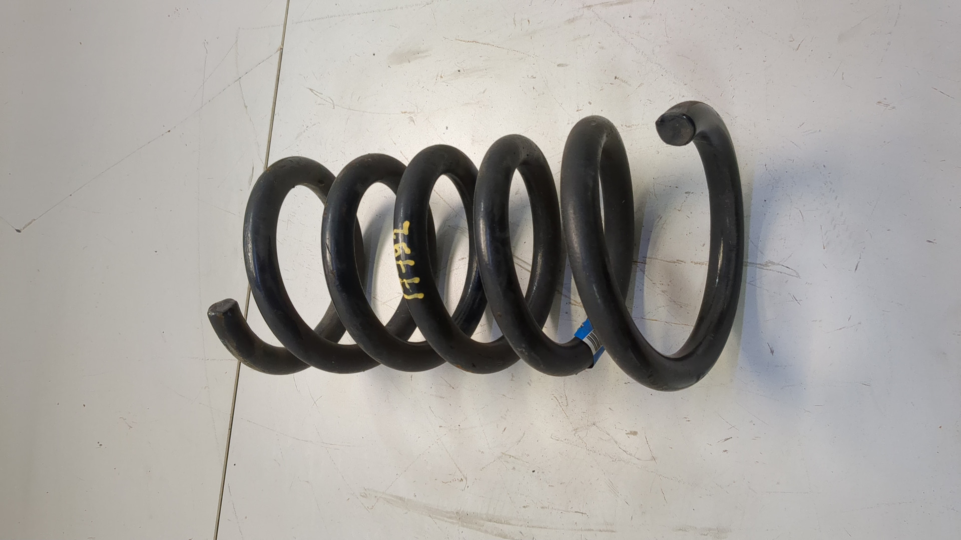 Пружина задняя