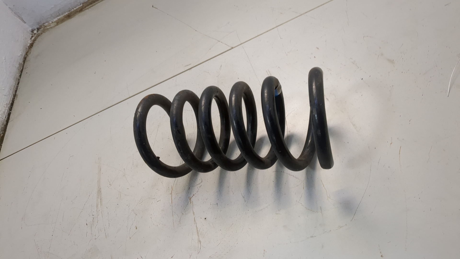 Пружина задняя