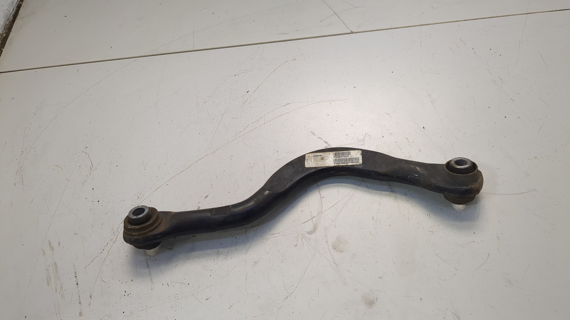 Рычаг задний левый